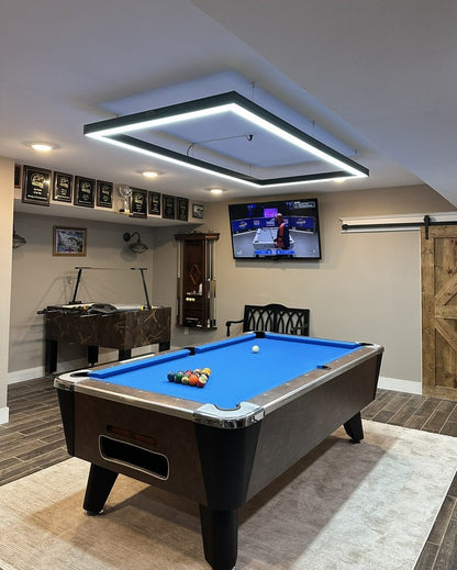 Game room with pool table, air hockey table, and TV.